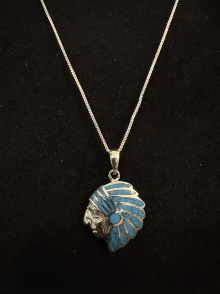 Unusual Zuni, Cheif, head, turquoise, and sterling necklace native made
