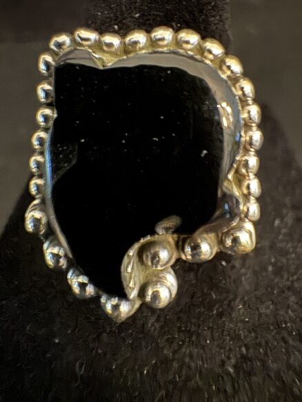 Very unusual black Onyx set in Sterling silver ghost ring