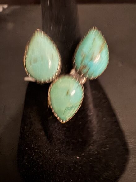 Beautiful three stone pear shaped turquoise set in Ster