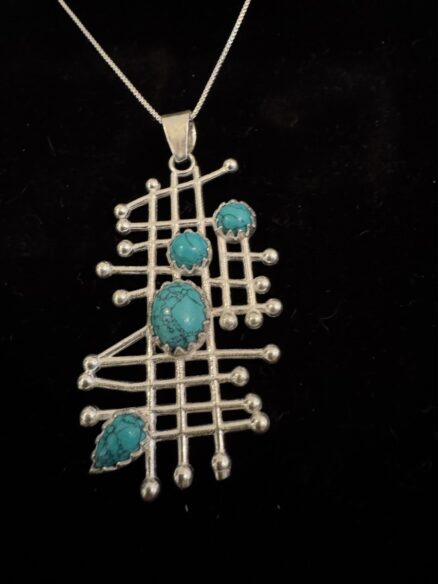 Beautiful turquoise and sterling silver pendant
