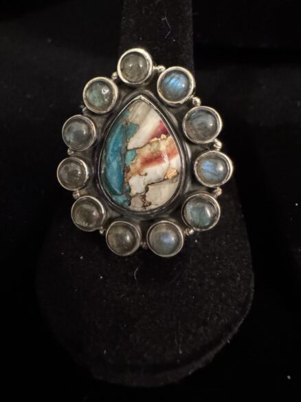 Blue moon, turquoise, surrounded with labradorite in a sterling silver setting