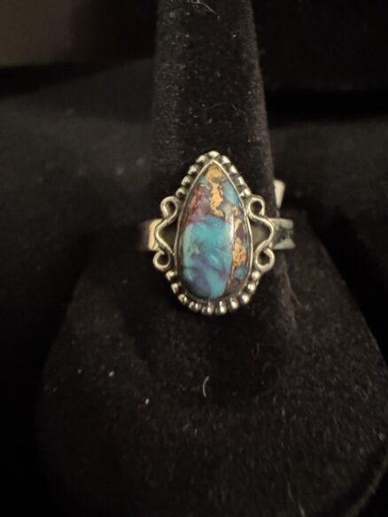 Petite turquoise stone set in in silver