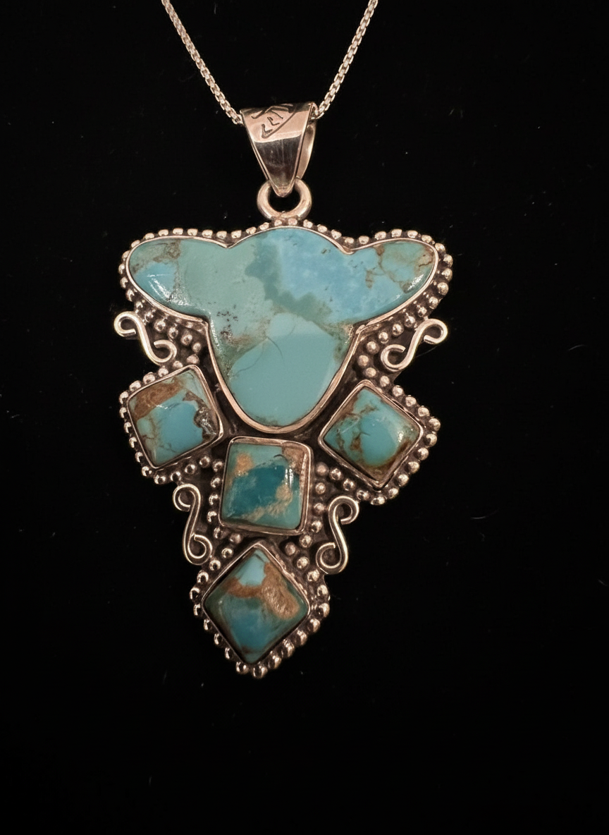 Amazing cow turquoise pendant set in Sterling silver chain included