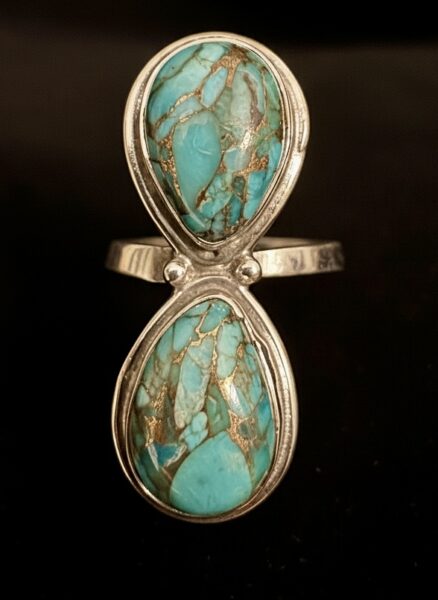 Beautiful genuine double turquoise teardrops set in a sterling silver setting