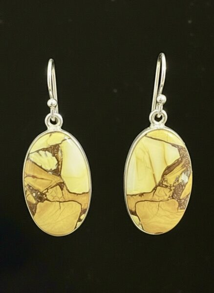 Genuine mookite agate earrings set in sterling silver setting
