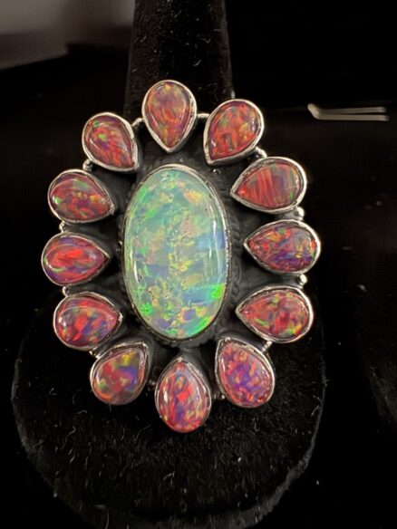 Beautiful opal and red opal ring set in a stunning sterling silver setting