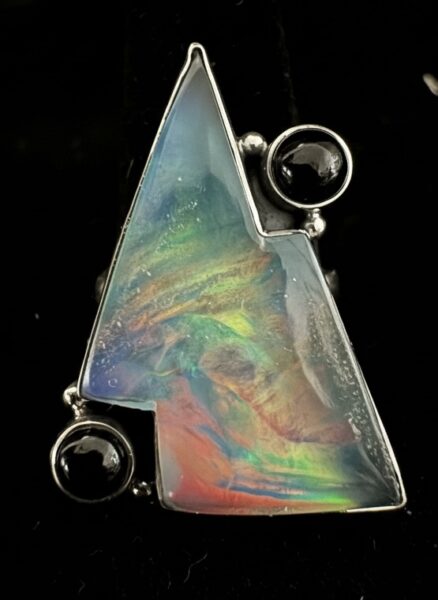 Stunning Opal, lightning bolt with black Onyx accents set in sterling silver ring