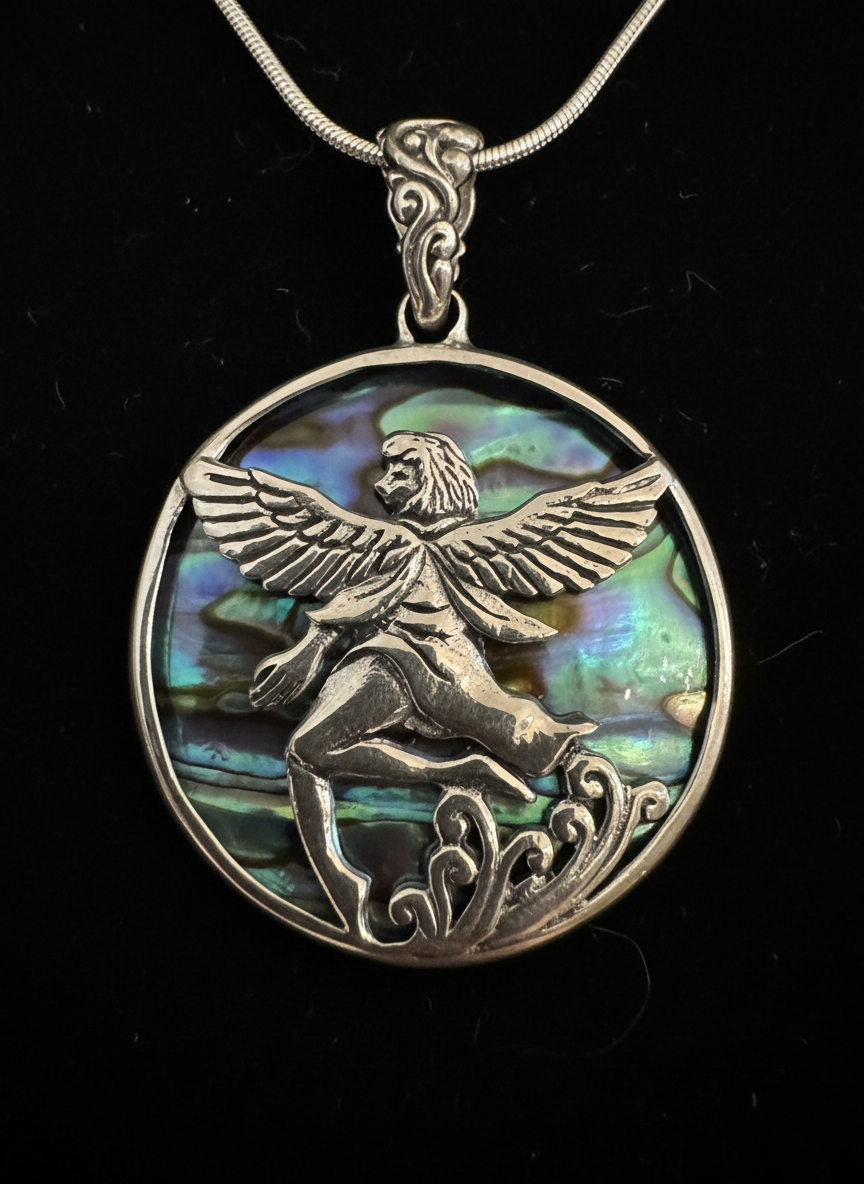 Beautiful abalone, angel pendant set in Sterling silver