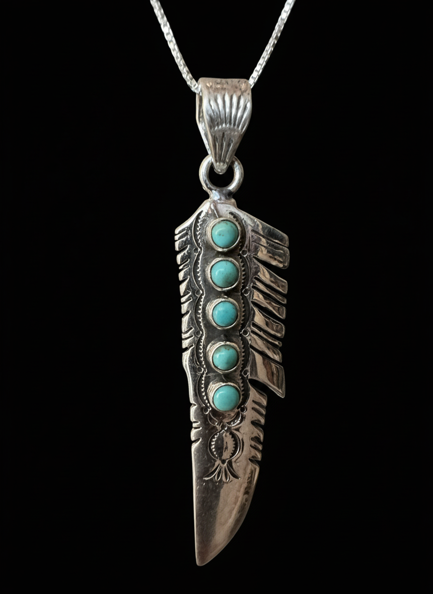 Native designed feather pendant with genuine turquoise stones